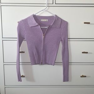 Purple long sleeve crop top with gold quarter zip